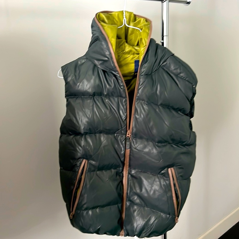Brand new without tags: Green puffer vest.